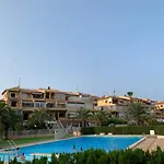 Апартаменты Under The Palm Trees